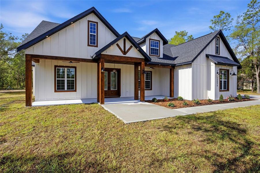 Front exterior of a new home in , Dunnellon, FL, highlighting curb appeal (Image 24). Front exterior of a new home in , Dunnellon, FL, highlighting curb appeal (Image 24).