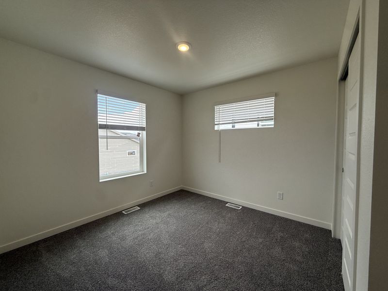 Spacious, unfurnished interior of a new home in Granary, Johnstown (Image 24).