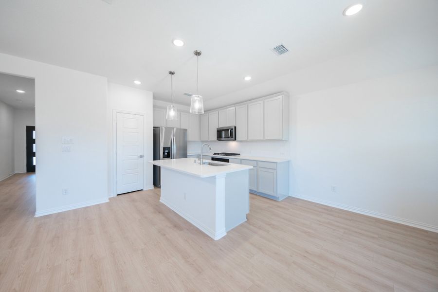 Furnished interior view inside a new home in Whitewing Trails, Princeton (Image 6).
