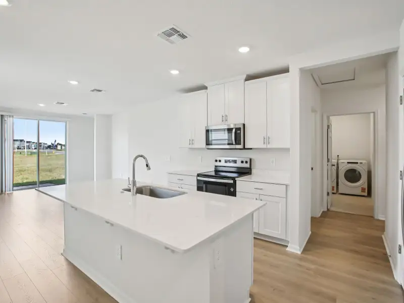 Furnished interior view inside a new home in Wynnstone - Classic Series, Davenport (Image 3).