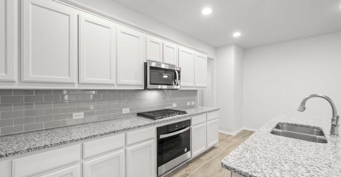 Representative exterior photo of a completed home built from the Dozier by Impression Homes in Redden Farms, Midlothian, TX (Image 10). Representative exterior photo of a completed home built from the Dozier by Impression Homes in Redden Farms, Midlothian, TX (Image 10).