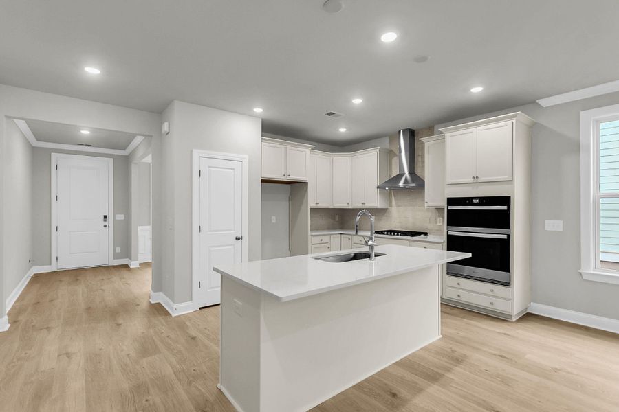 Furnished interior view inside a new home in Tidewater at Lakes of Cane Bay, Summerville (Image 6).