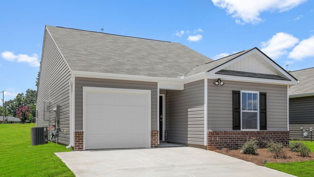 Front exterior of a new home in Harper Ridge, Roebuck, SC, highlighting curb appeal (Image 2). Front exterior of a new home in Harper Ridge, Roebuck, SC, highlighting curb appeal (Image 2).