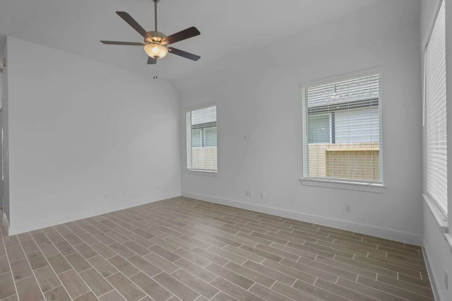 Representative unfurnished interior of a home built from the Mickelson by Chesmar Homes in Riceland Alley Loads, Mont Belvieu (Image 76).