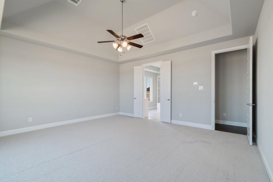 Primary Bedroom | Concept 3634 at Hidden Creek Estates in Van Alstyne, TX by Landsea Homes