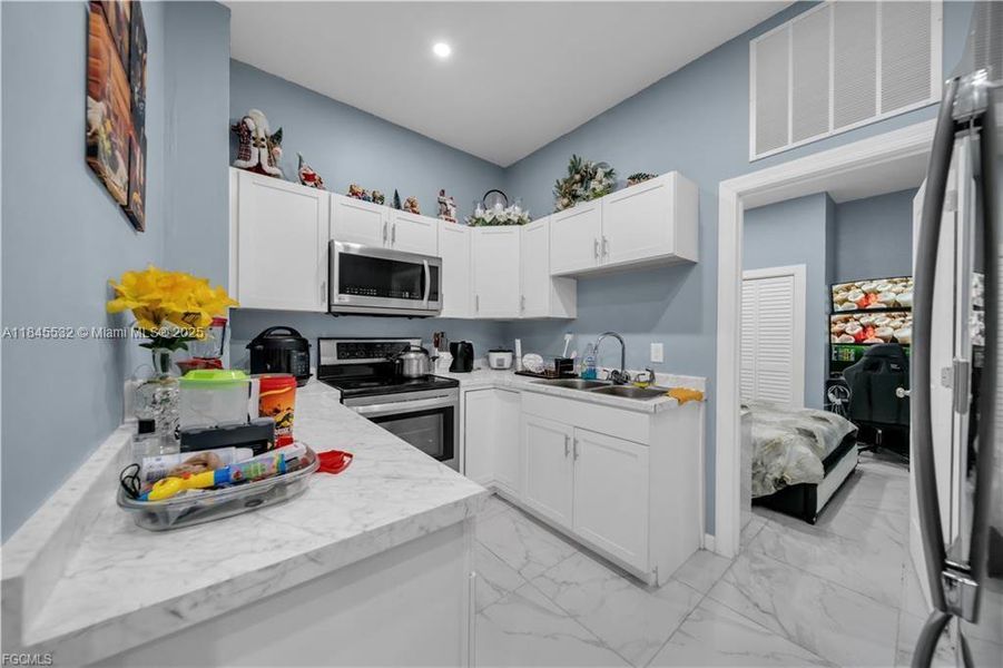 Furnished interior view inside a new home in , Cape Coral (Image 36). Furnished interior view inside a new home in , Cape Coral (Image 36).