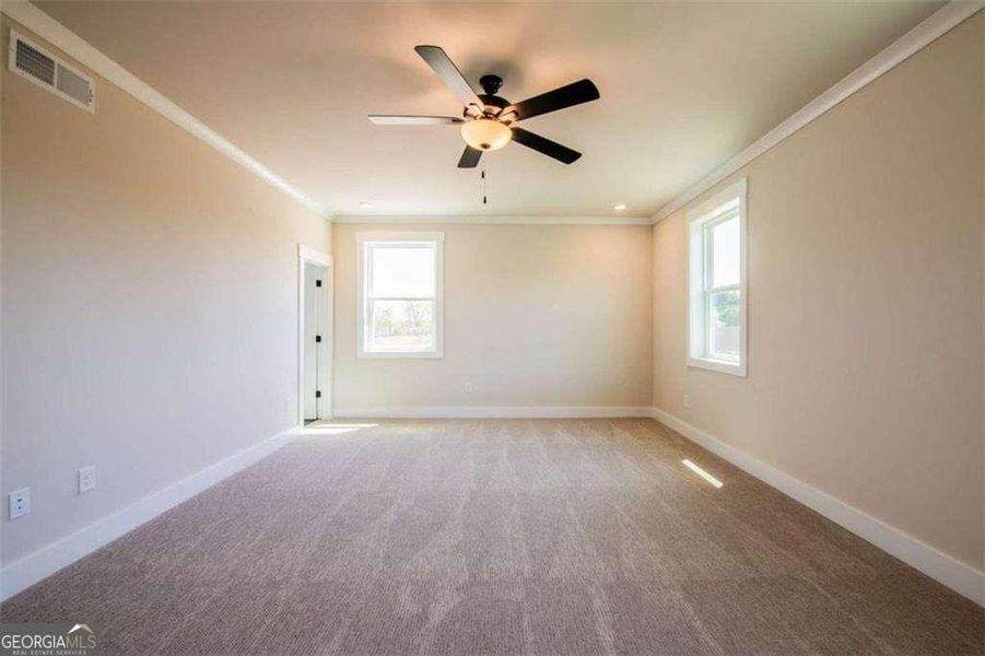 Spacious, unfurnished interior of a new home in The Paddocks at Doc Hughes, Buford (Image 30).