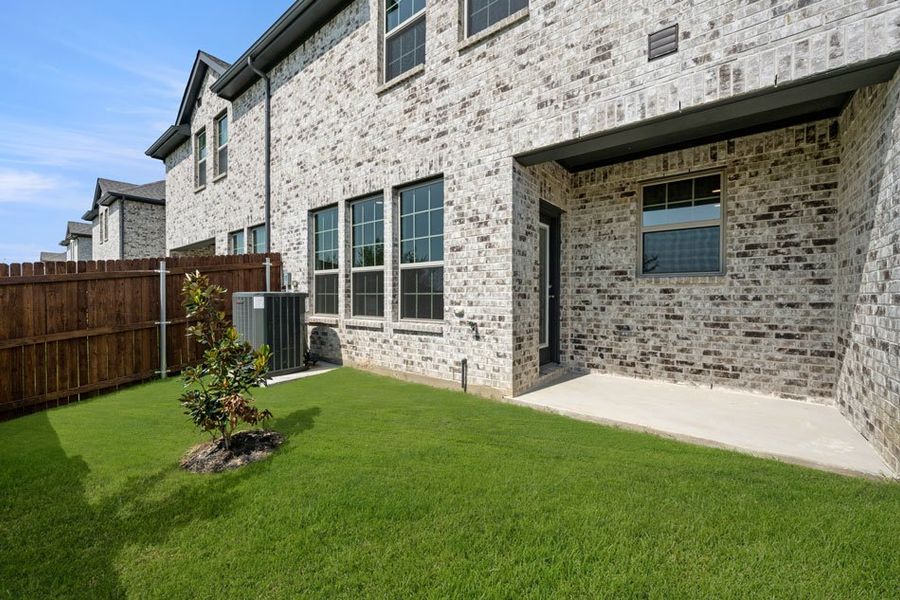 Representative exterior photo of a completed home built from the Brownwood by Impression Homes in Main Street Village, Mansfield, TX (Image 27). Representative exterior photo of a completed home built from the Brownwood by Impression Homes in Main Street Village, Mansfield, TX (Image 27).