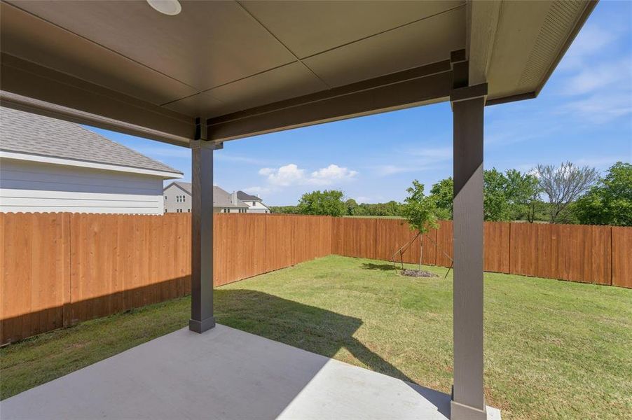 Exterior details and patio area of a home in Covenant Park, Springtown (Image 27).