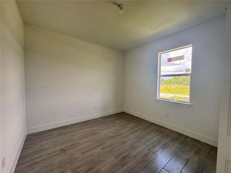 Spacious, unfurnished interior of a new home in , Port Charlotte (Image 31).