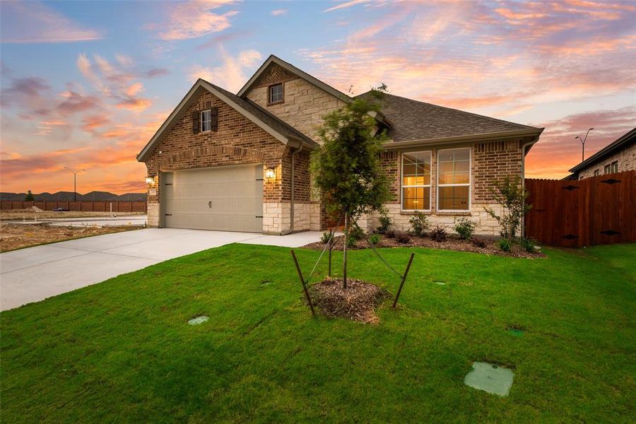 Front exterior of a new home in Northstar, Haslet, TX, highlighting curb appeal (Image 18).