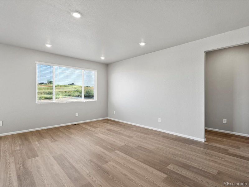 Spacious, unfurnished interior of a new home in Poudre Heights: The Lakes Collection, Windsor (Image 8).