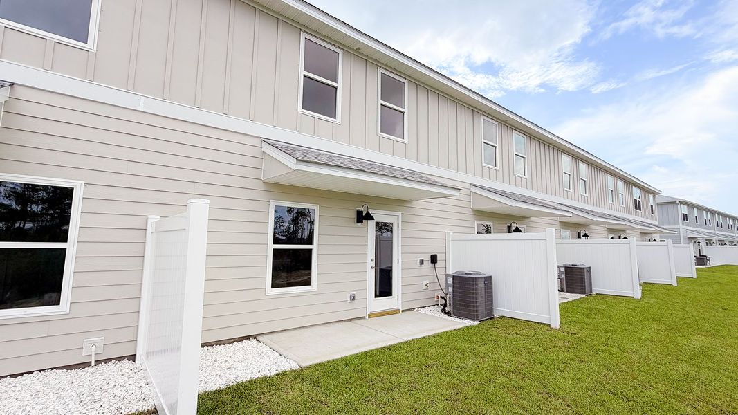 Exterior details and patio area of a home in WindMark Beach, Port Saint Joe (Image 20).