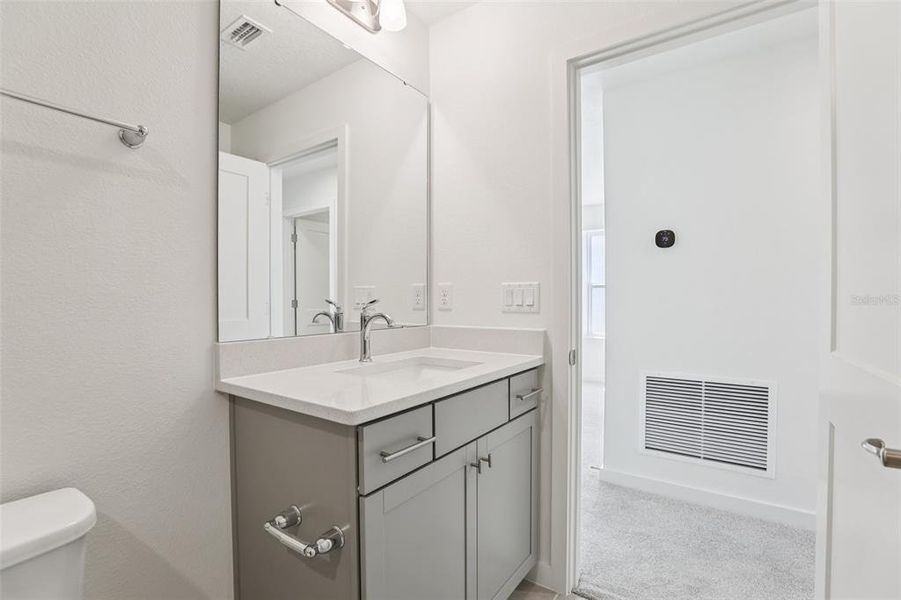 Furnished interior view inside a new home in Trinity Place, St. Cloud (Image 9).