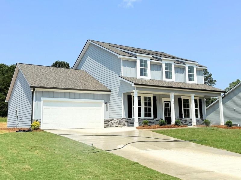 Front exterior of a new home in Westlyn, Winder, GA, highlighting curb appeal (Image 1).