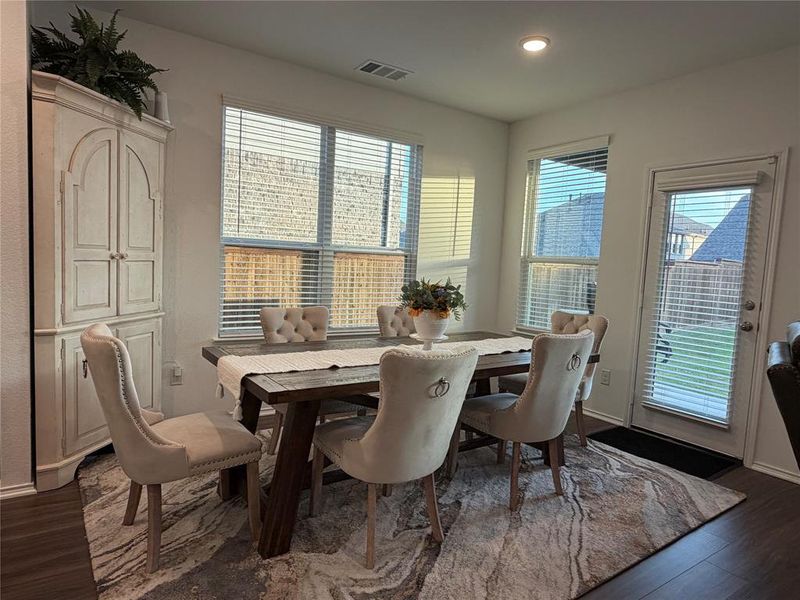 Breakfast Area Opens to Covered Patio and Back Yard.