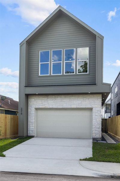 Front exterior of a new home in , Houston, TX, highlighting curb appeal (Image 23). Front exterior of a new home in , Houston, TX, highlighting curb appeal (Image 23).
