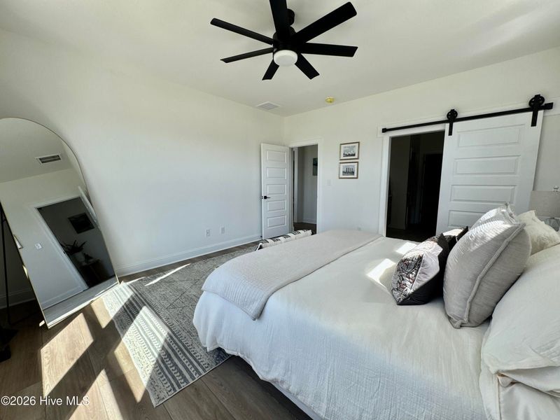 Furnished interior view inside a new home in Dixon Grove, Grimesland (Image 11).