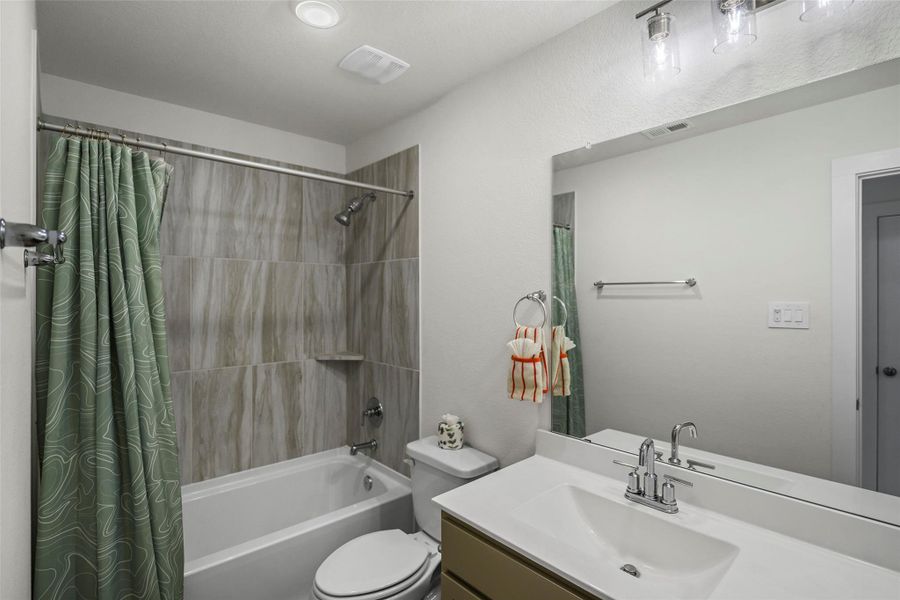 Furnished interior view inside a new home in Sorella, Tomball (Image 5).