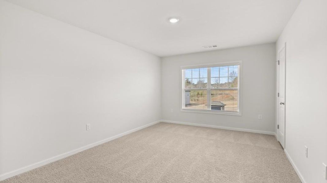 Spacious, unfurnished interior of a new home in Haven Abbey, Cumming (Image 35).