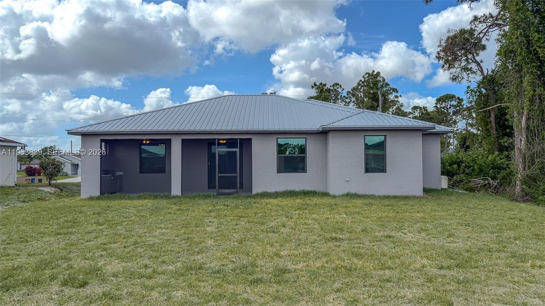 Exterior details and patio area of a home in , Lehigh Acres (Image 25). Exterior details and patio area of a home in , Lehigh Acres (Image 25).