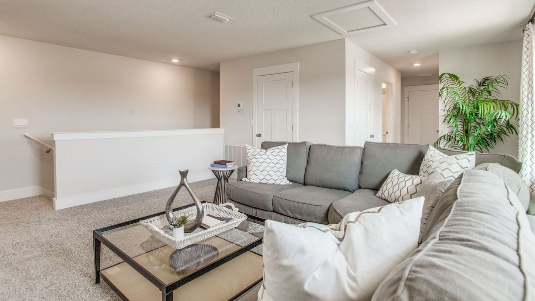 Furnished interior view inside a new home in Ashton Park Phase III, Freeport (Image 23).