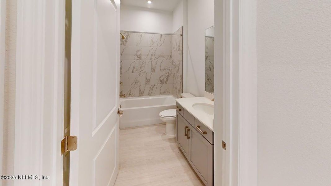 Furnished interior view inside a new home in RiverTown - WaterSong, St. Johns (Image 13).