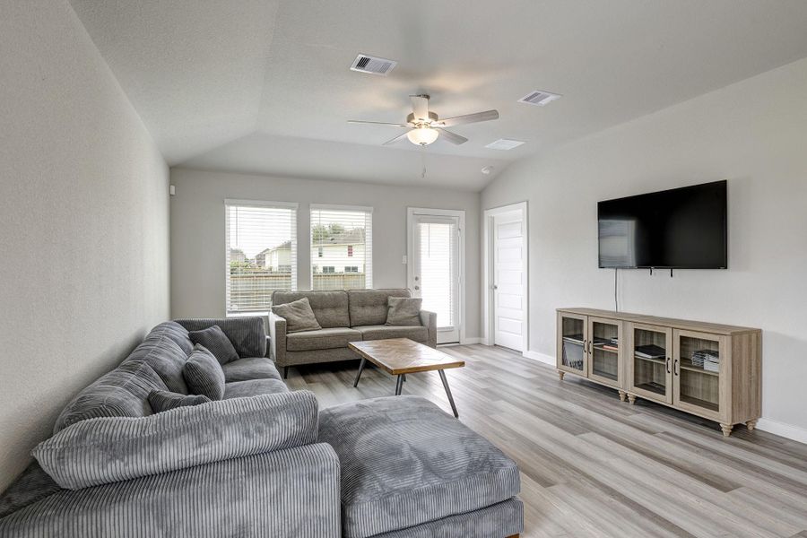 The living area has plenty of space for large furniture, perfect for movie nights! The living area has plenty of space for large furniture, perfect for movie nights!