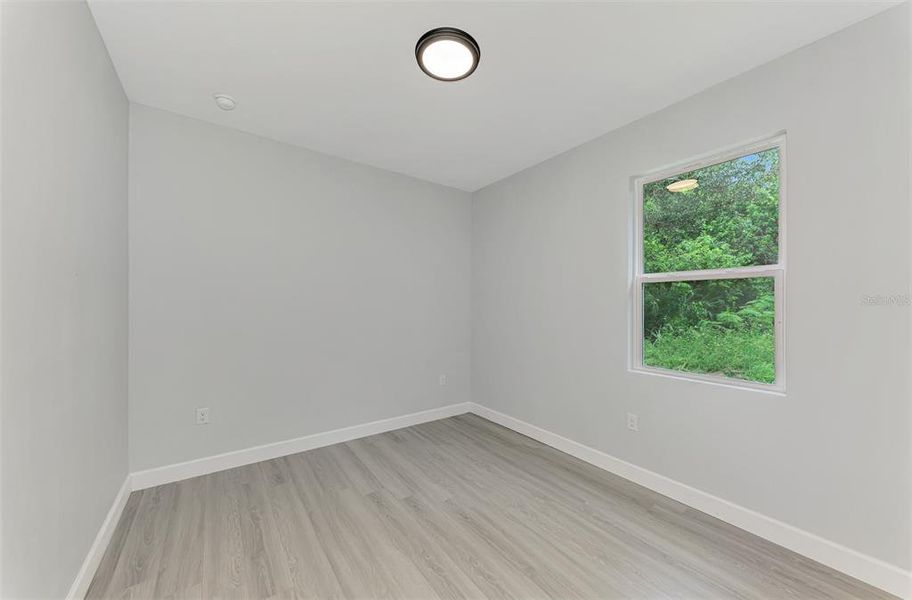Spacious, unfurnished interior of a new home in , Port Charlotte (Image 16).
