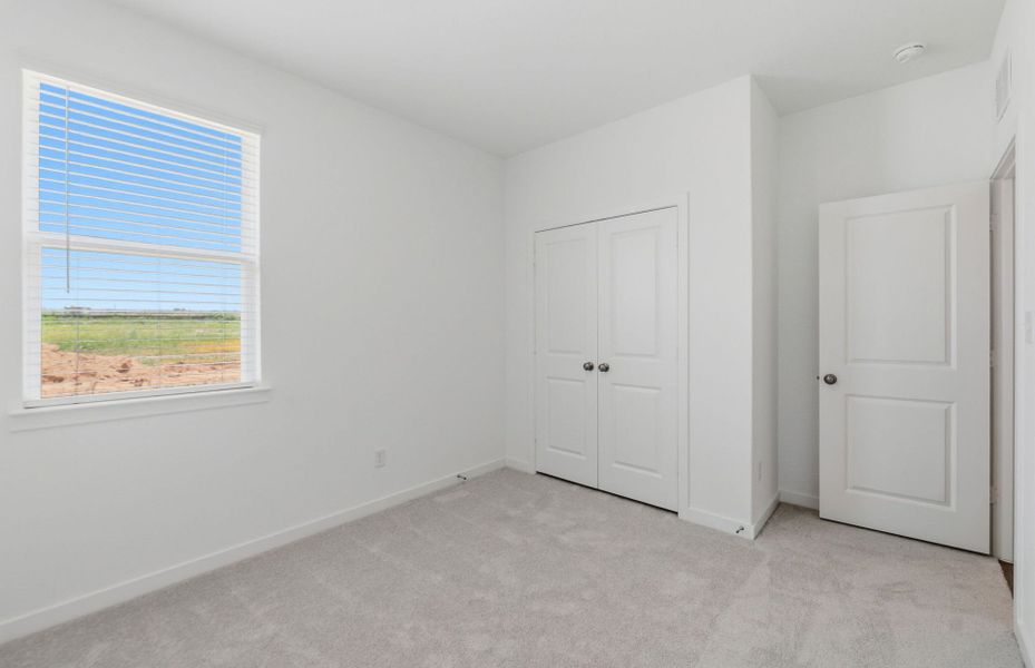 Spacious, unfurnished interior of a new home in Crosswinds, Kyle (Image 15).