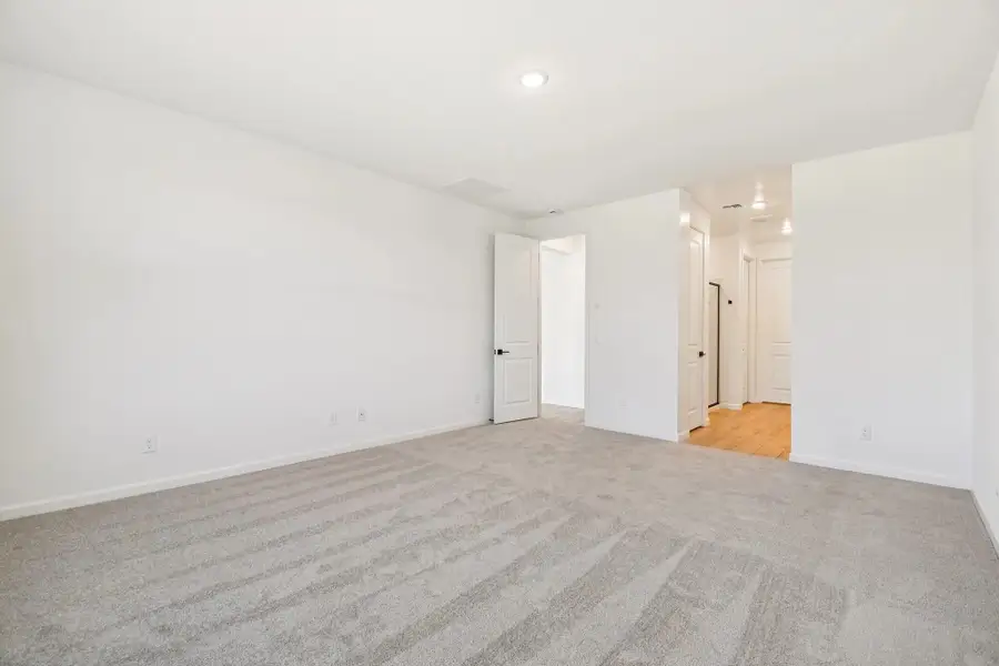 Primary suite. Not actual home, finishes and options may vary by community. Primary suite. Not actual home, finishes and options may vary by community.