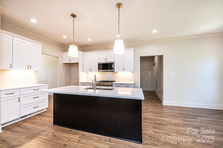 Furnished interior view inside a new home in , Hickory (Image 9).
