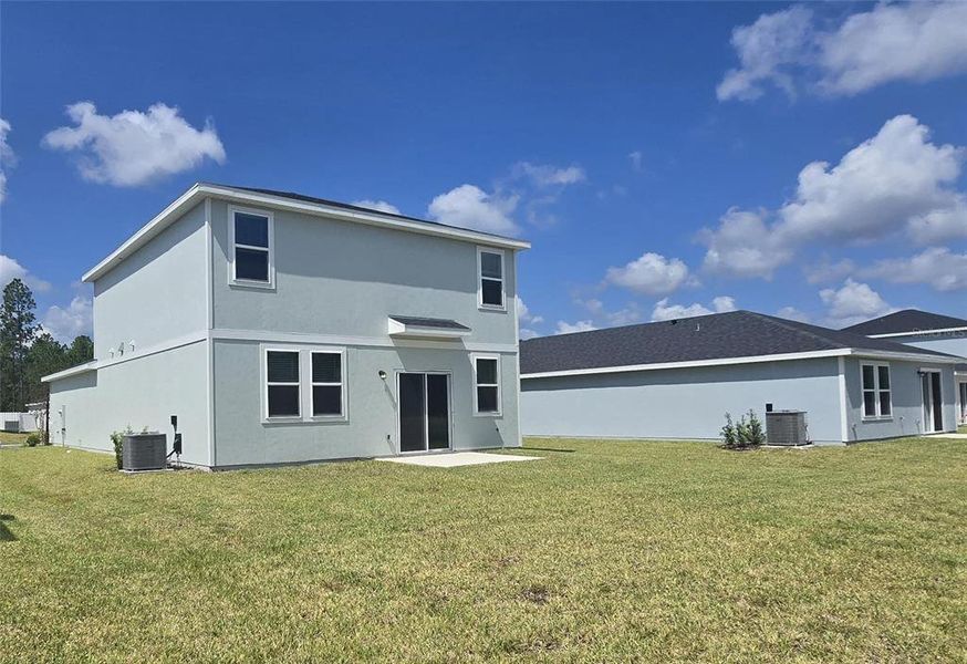 Exterior details and patio area of a home in Flagler Village - Classic Series, Palm Coast (Image 19).