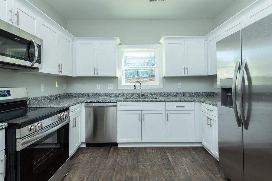 Representative furnished interior of a home built from the Marshall by Foundation Home Builders LLC in Pinnix Loop, Burlington (Image 7).