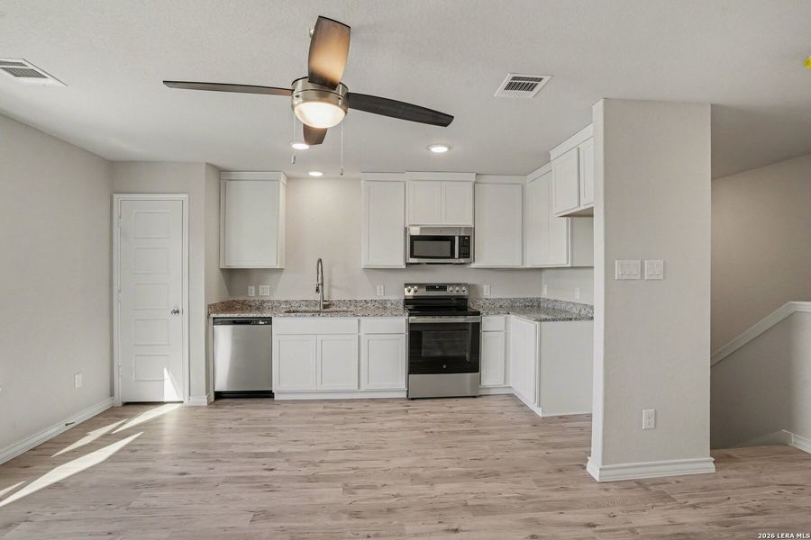 Furnished interior view inside a new home in , San Antonio (Image 6).