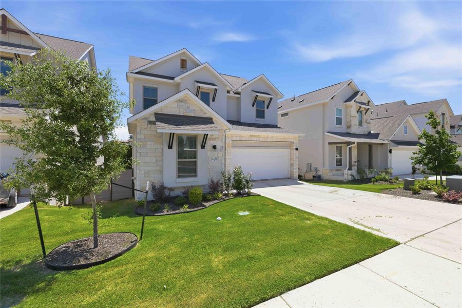 Front exterior of a new home in , Georgetown, TX, highlighting curb appeal (Image 2). Front exterior of a new home in , Georgetown, TX, highlighting curb appeal (Image 2).