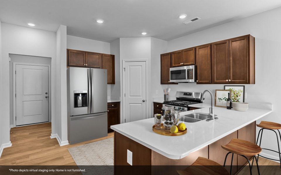 Furnished interior view inside a new home in Hanes Lake, Winston-Salem (Image 5). Furnished interior view inside a new home in Hanes Lake, Winston-Salem (Image 5).