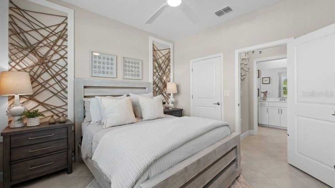 Furnished interior view inside a new home in Island Lakes at Coco Bay, Englewood (Image 8).