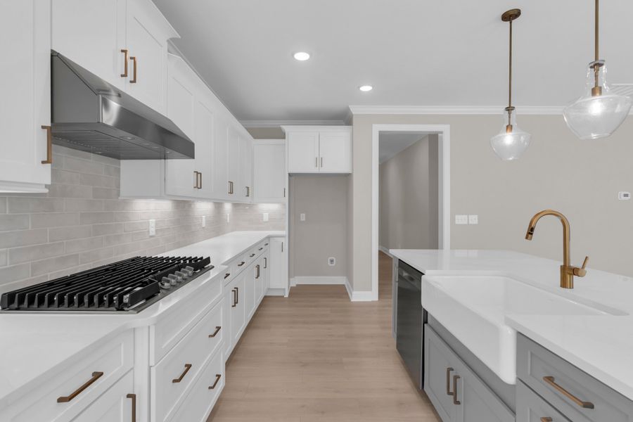 Representative furnished interior of a home built from the The Bradley by RobuckHomes in Windwater, Hampstead (Image 50).