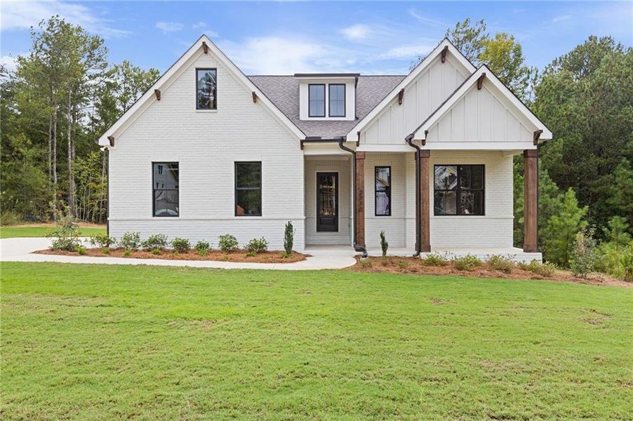 Front exterior of a new home in , Watkinsville, GA, highlighting curb appeal (Image 26). Front exterior of a new home in , Watkinsville, GA, highlighting curb appeal (Image 26).
