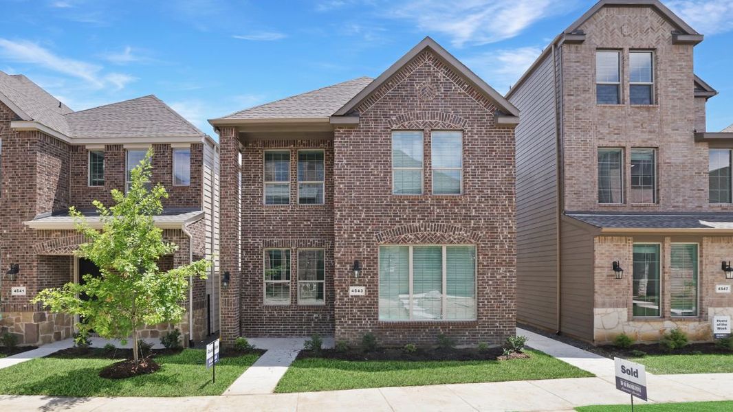 Representative exterior photo of a completed home built from the Saddlebrook by D.R. Horton in The Avenue, Allen, TX (Image 2). Representative exterior photo of a completed home built from the Saddlebrook by D.R. Horton in The Avenue, Allen, TX (Image 2).