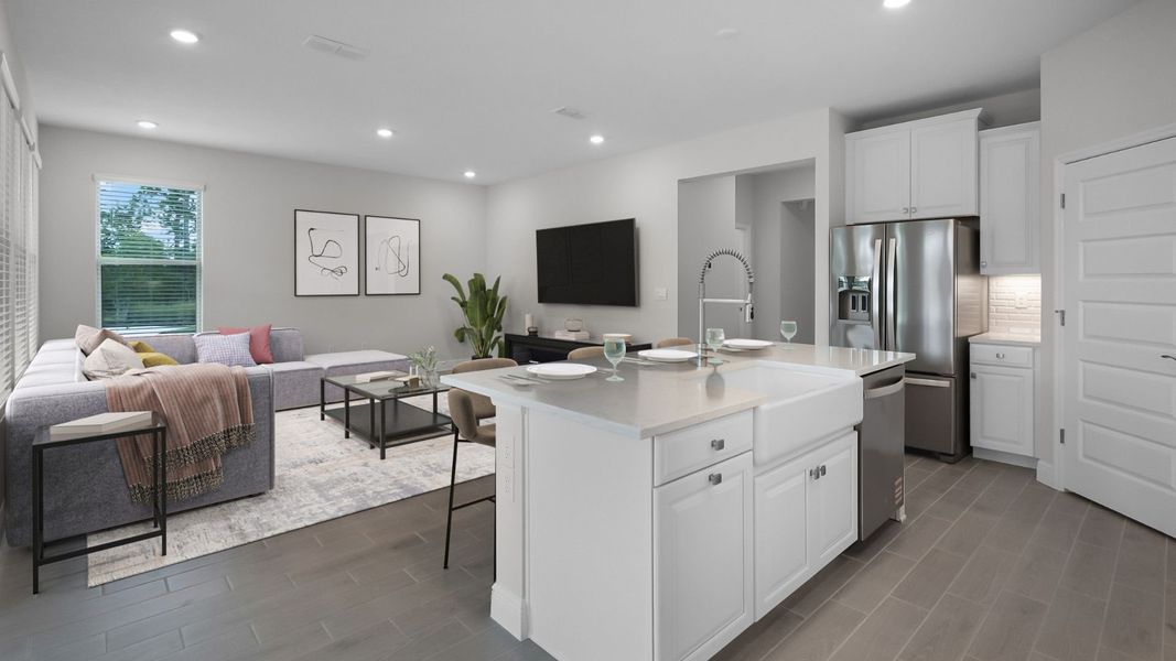 Representative furnished interior of a home built from the BELLMORE by D.R. Horton in Waterleigh, Winter Garden (Image 5).