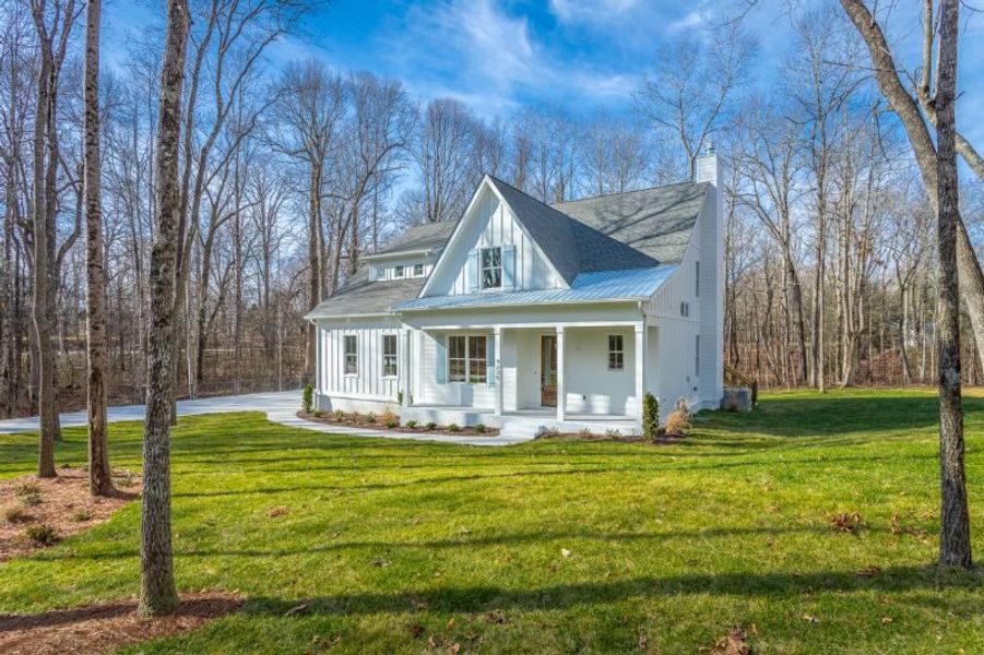 Representative exterior photo of a completed home built from the Carolina A by Riverstone Construction, LLC in Jasper Highlands, Guild, TN (Image 34).