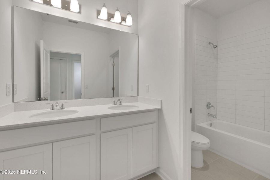 Furnished interior view inside a new home in Cherry Elm at SilverLeaf, St. Augustine (Image 5).