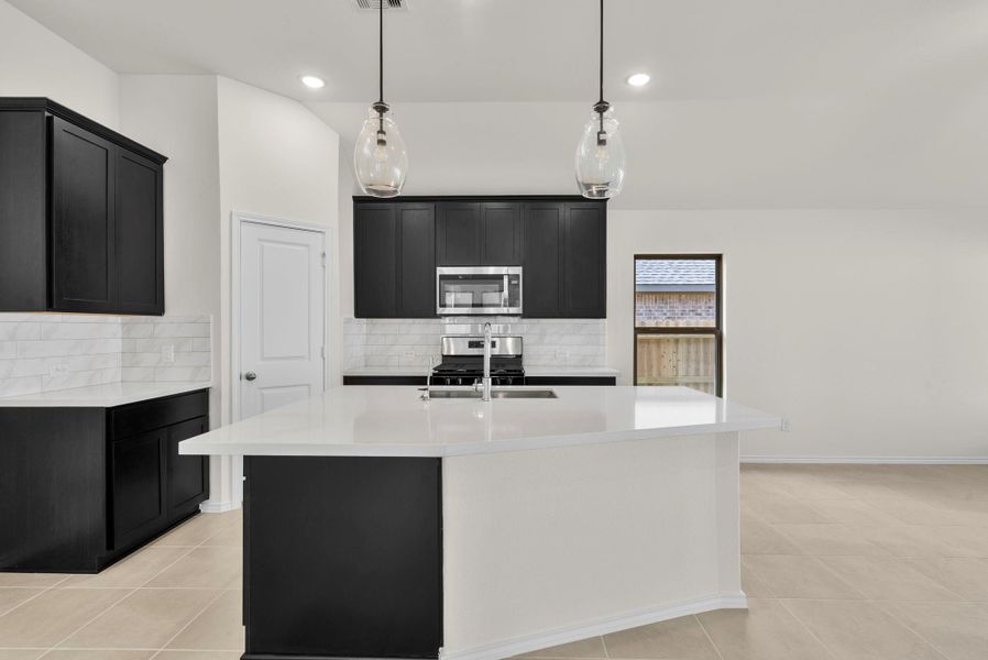 Furnished interior view inside a new home in Grand Central Park, Conroe (Image 5).