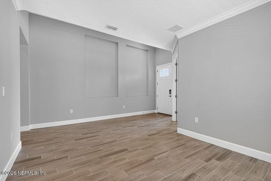 Spacious, unfurnished interior of a new home in Colbert Landings, Palm Coast (Image 26).