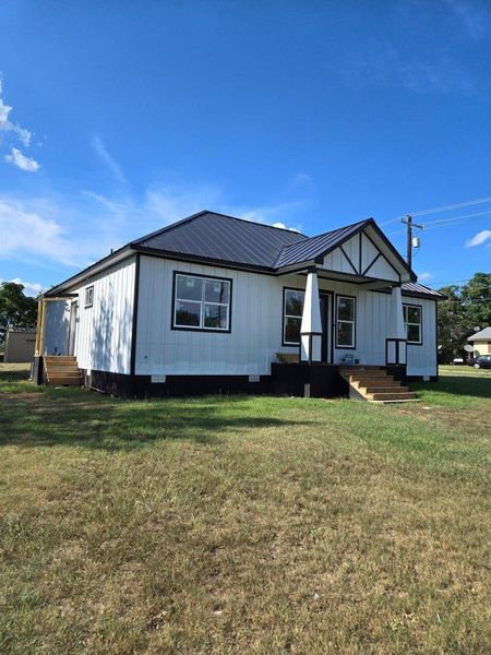 View of front of home with a front lawn