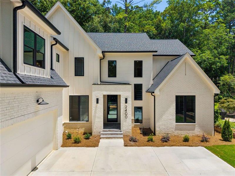 Front exterior of a new home in , Atlanta, GA, highlighting curb appeal (Image 25). Front exterior of a new home in , Atlanta, GA, highlighting curb appeal (Image 25).