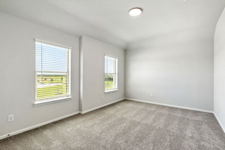 Bedroom in the Sapphire home plan by Trophy Signature Homes – REPRESENTATIVE PHOTO Bedroom in the Sapphire home plan by Trophy Signature Homes – REPRESENTATIVE PHOTO
