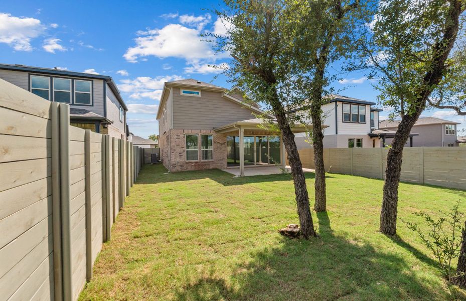 Exterior details and patio area of a home in Wolf Ranch, Georgetown (Image 23).